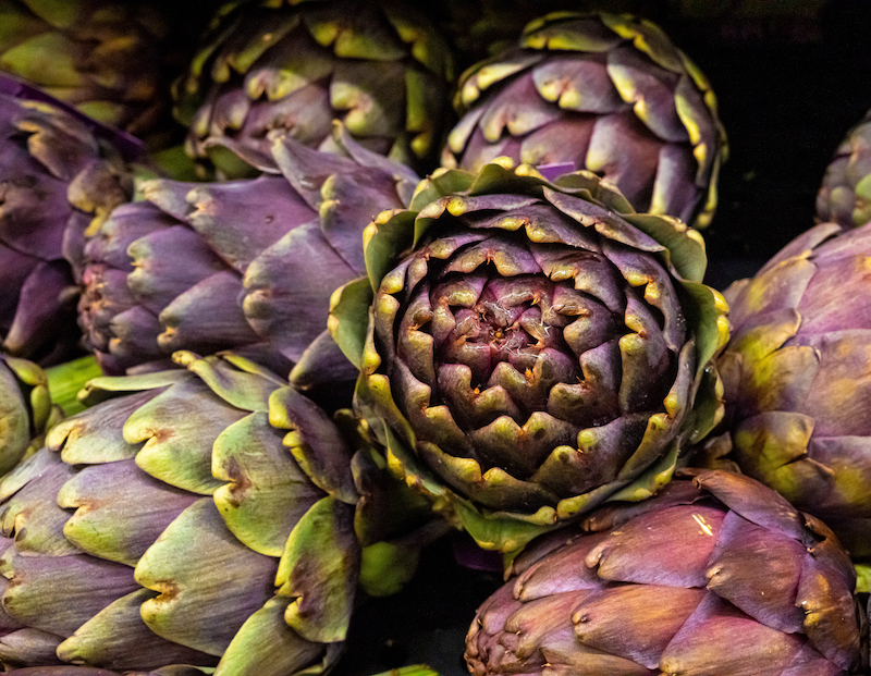 A picture of a bunch of artichokes